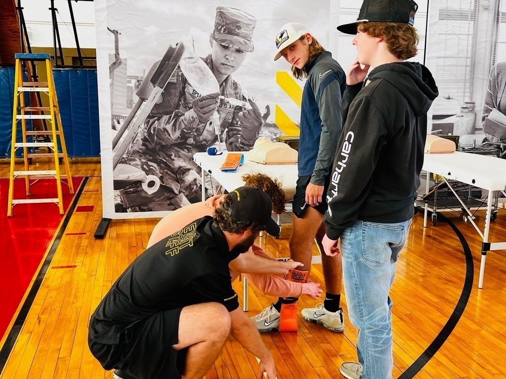 Students practicing first aid